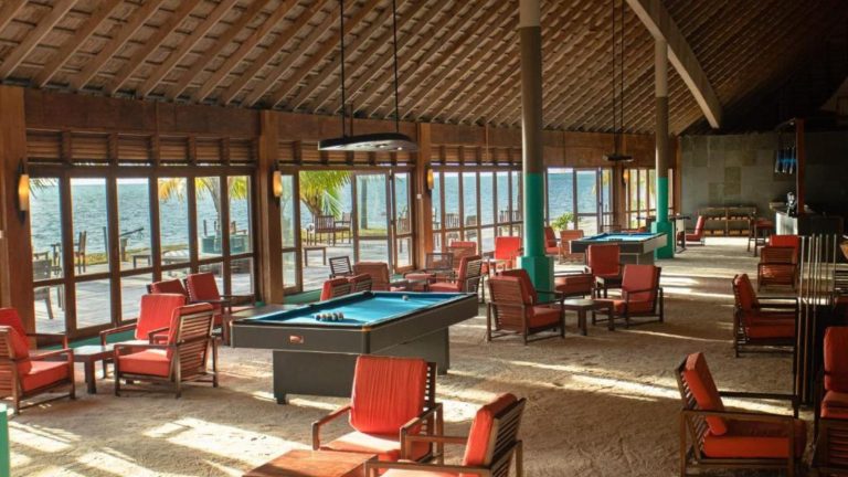 Pool table with chairs